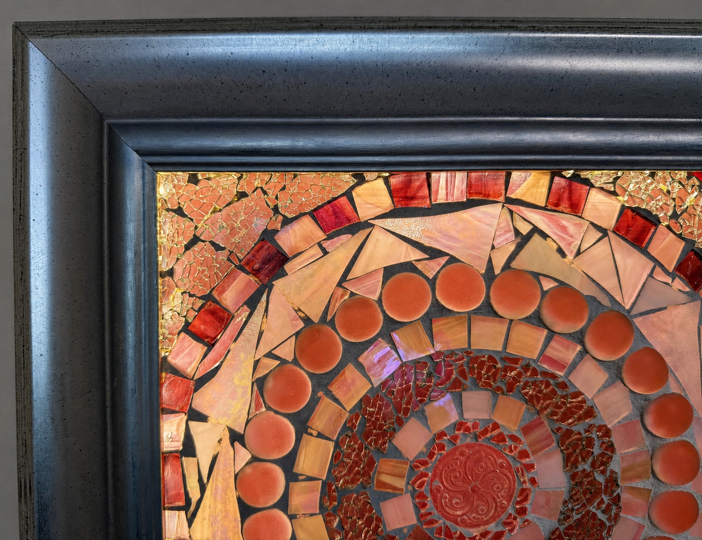 Eye of the Desert — spiral sun detail, dark frame